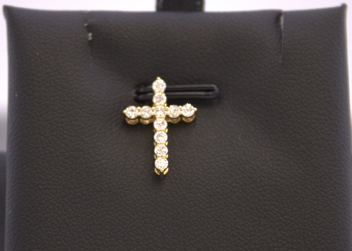 14k Yellow gold and diamond cross pendant.