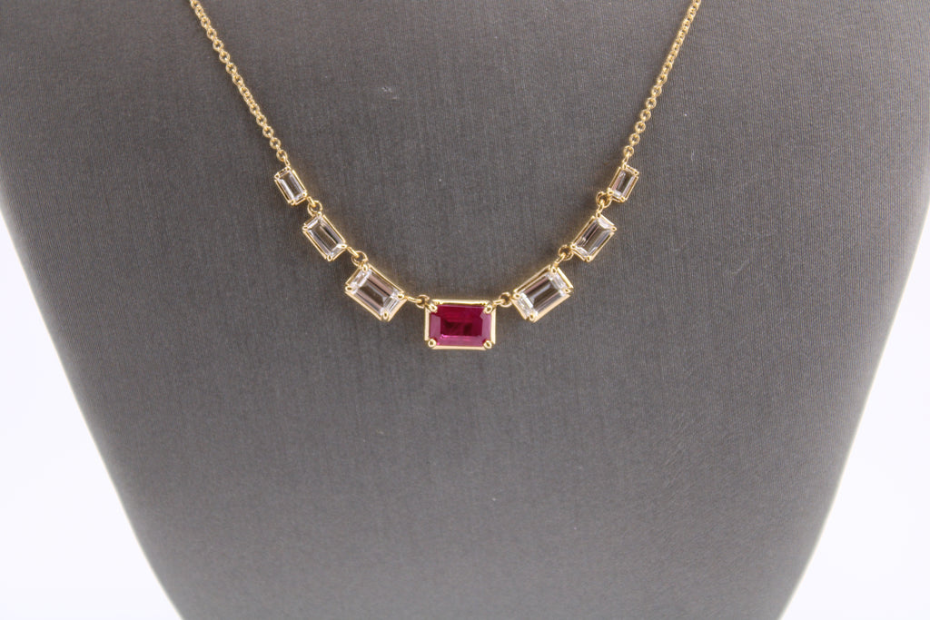 14kt Yellow Gold White Topaz and Ruby Fashion Necklace.