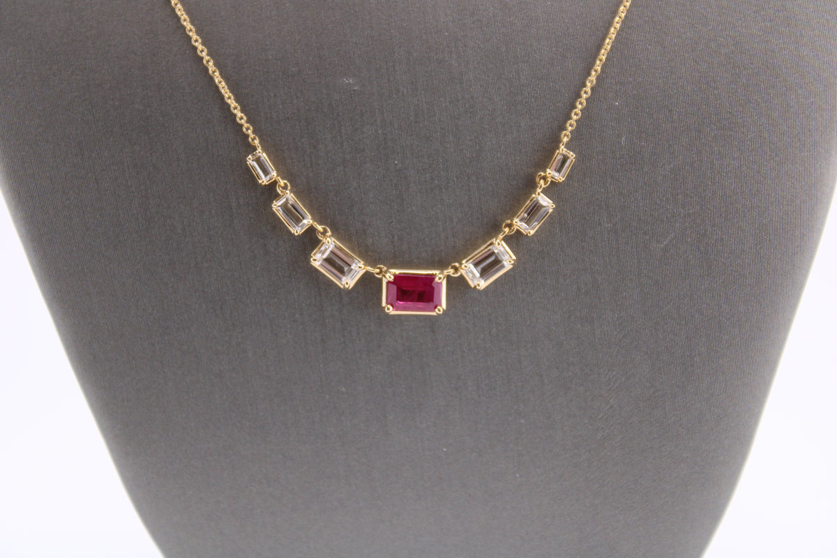 14kt Yellow Gold White Topaz and Ruby Fashion Necklace.
