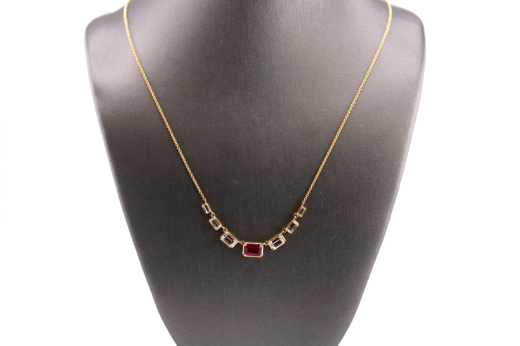 14kt Yellow Gold White Topaz and Ruby Fashion Necklace.