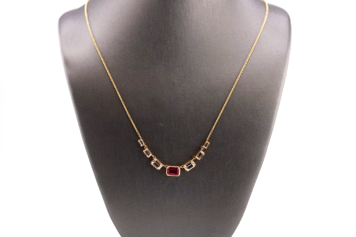 14kt Yellow Gold White Topaz and Ruby Fashion Necklace.