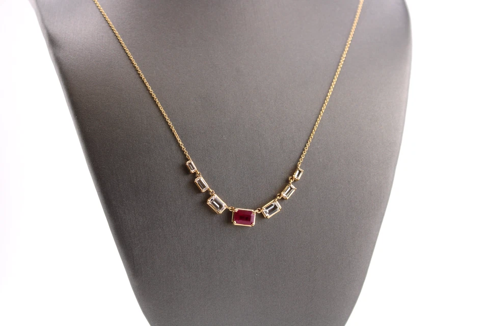 14kt Yellow Gold White Topaz and Ruby Fashion Necklace.